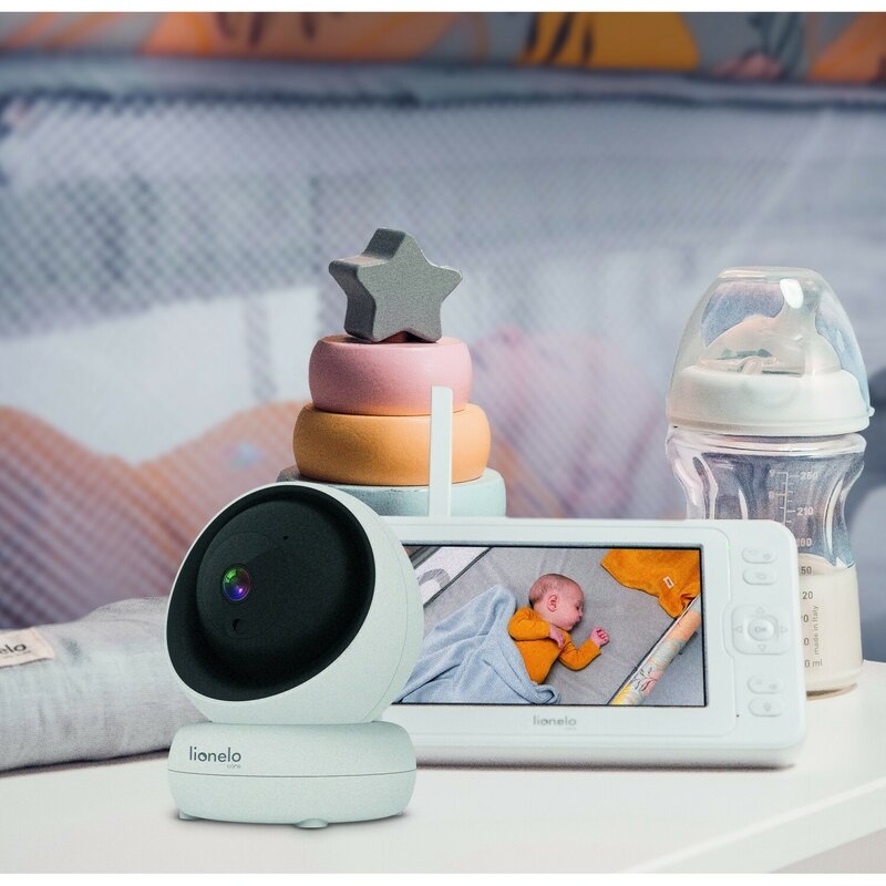 Lionelo - Videofon Babyline 8.3, Cu termometru, Cu melodii, Comunicare in 2 sensuri, Rotire 360 grade, Alb Lionelo - Videofon Babyline 8.3, Cu termometru, Cu melodii, Comunicare in 2 sensuri, Rotire 360 grade, Alb
